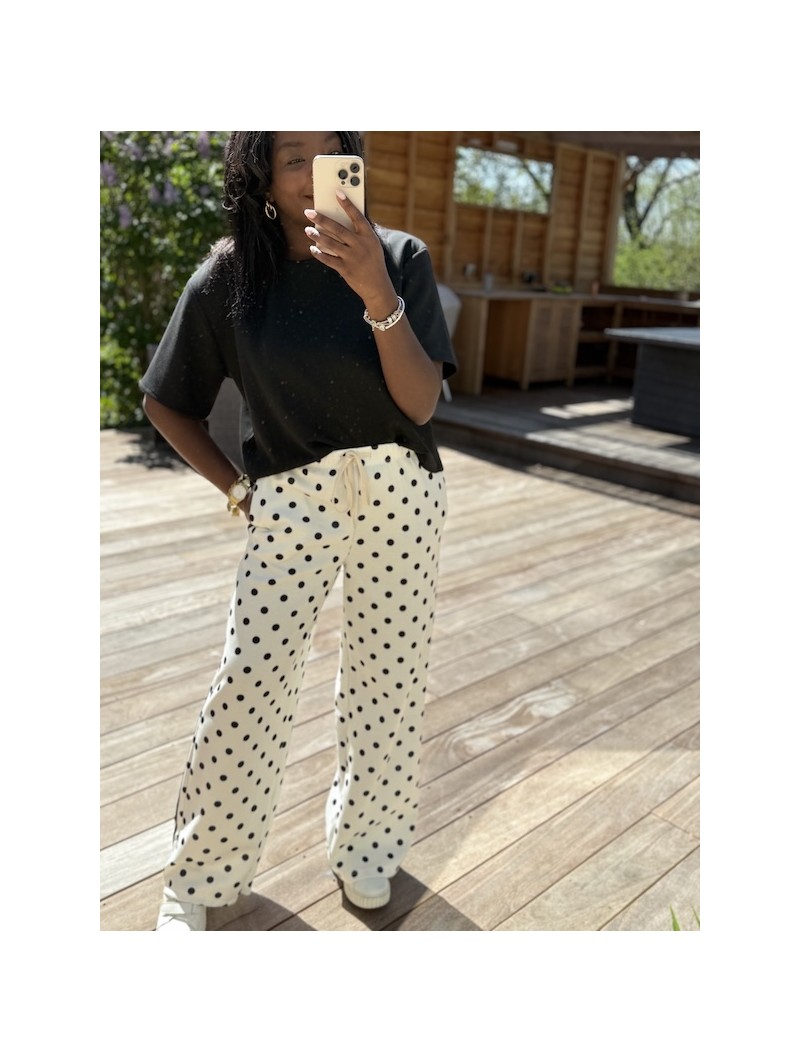 Pantalon blanc pois noir