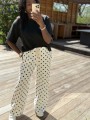 Pantalon blanc pois noir